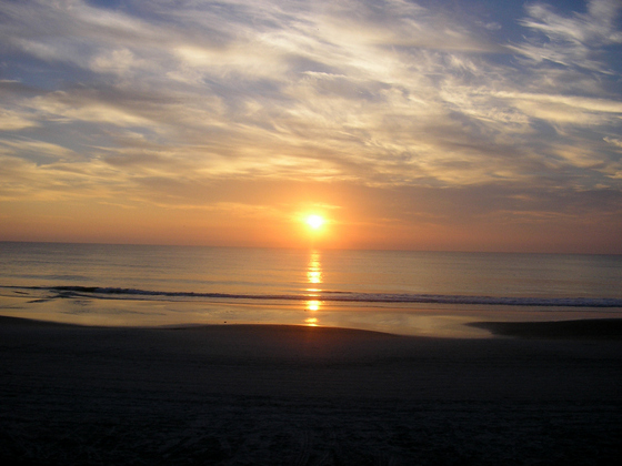 'Sunrise over the Atlantic Ocean, taken on the shores of Daytona Beach in Florida, USA.' Image by Mrmiscellanious. (from https://commons.wikimedia.org/wiki/File:Sunrise-Daytona-Beach-FL.jpg) This file is in the public domain.